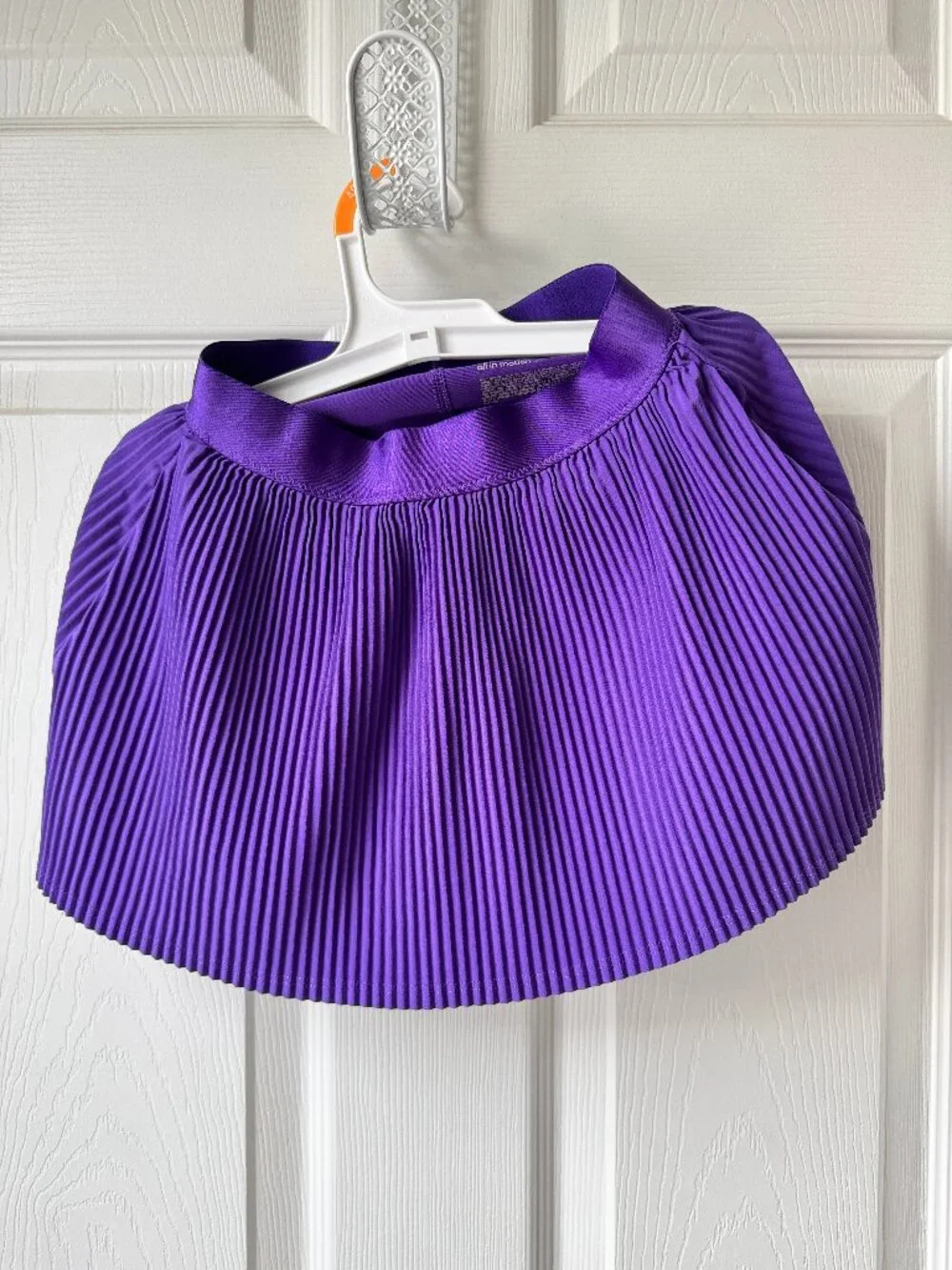 Girl’s Purple Pleat athletic mini skirt, built in shorts, S 6/7
